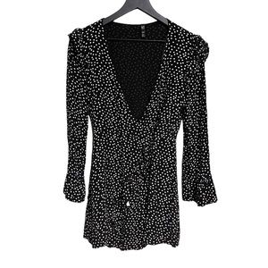Zara Black and white polka dot ruffled romper size small